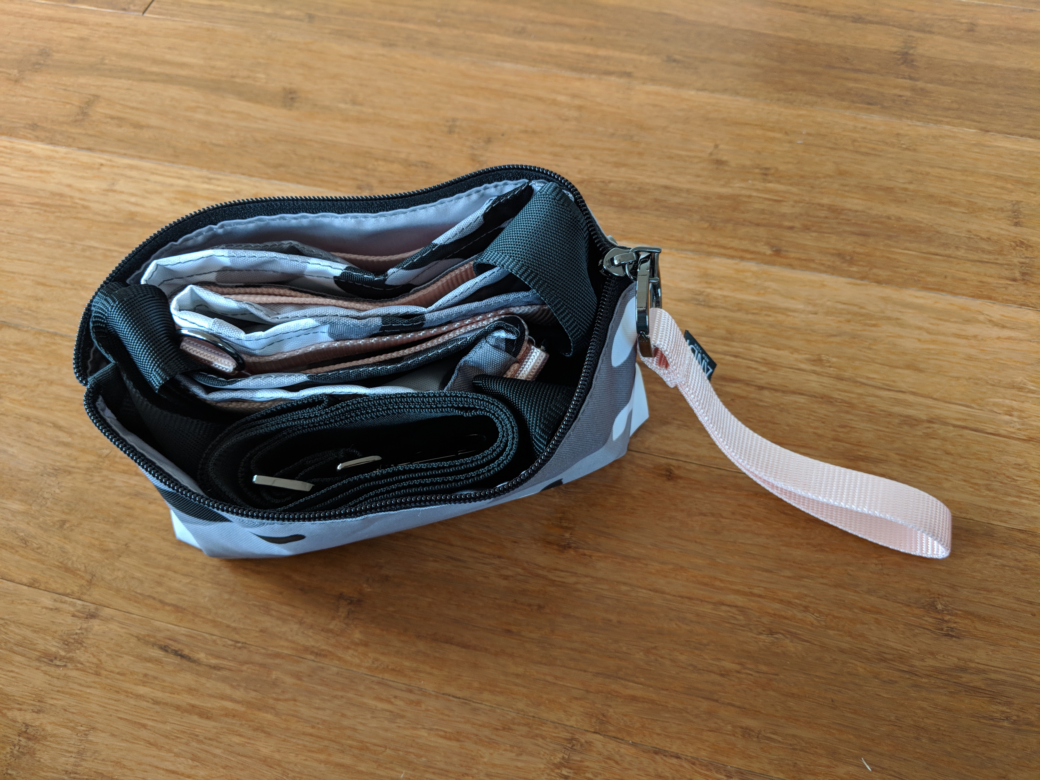 Andi Bag Review: Winter Camo and Quartz Pink compact transformation