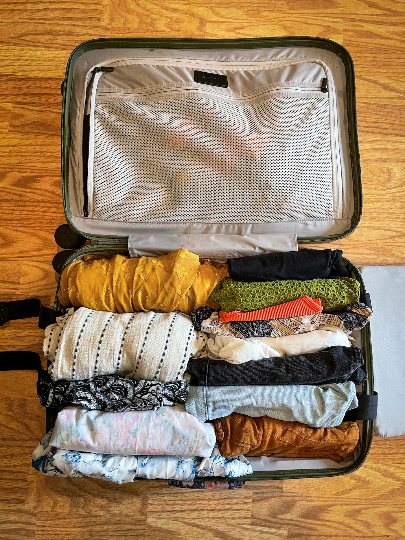 Marie Kondo KonMari folding method in luggage Monos carry on suitcase