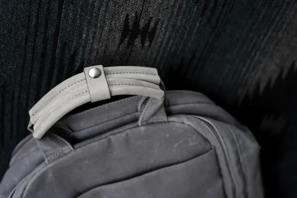 backpack top leather handles grey