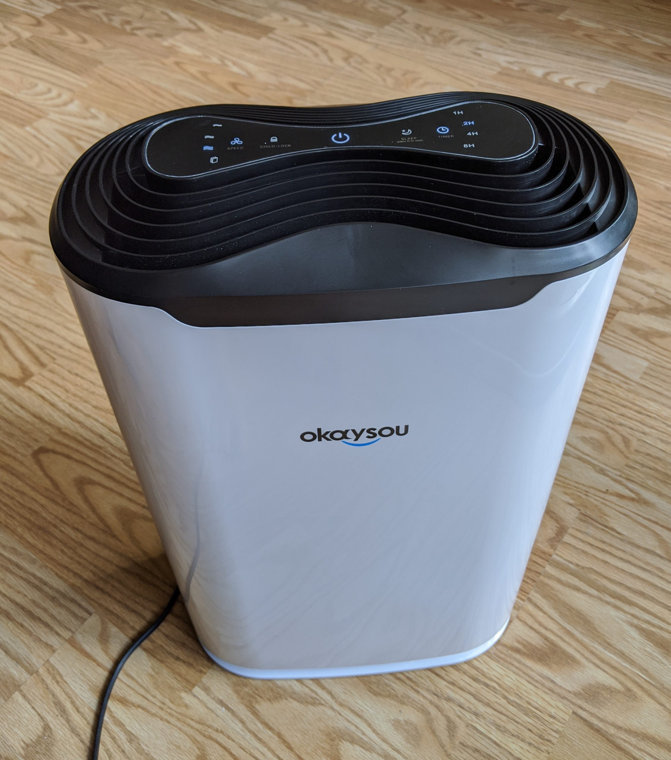 okaysou air purifier standing in room