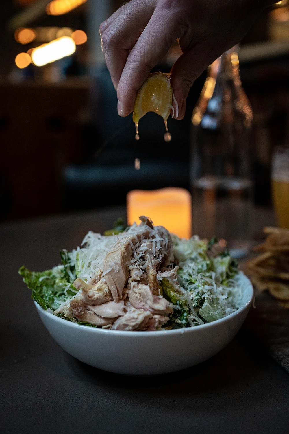 Happy hour caesar salad with rotisserie chicken from Victor Tavern in downtown Seattle