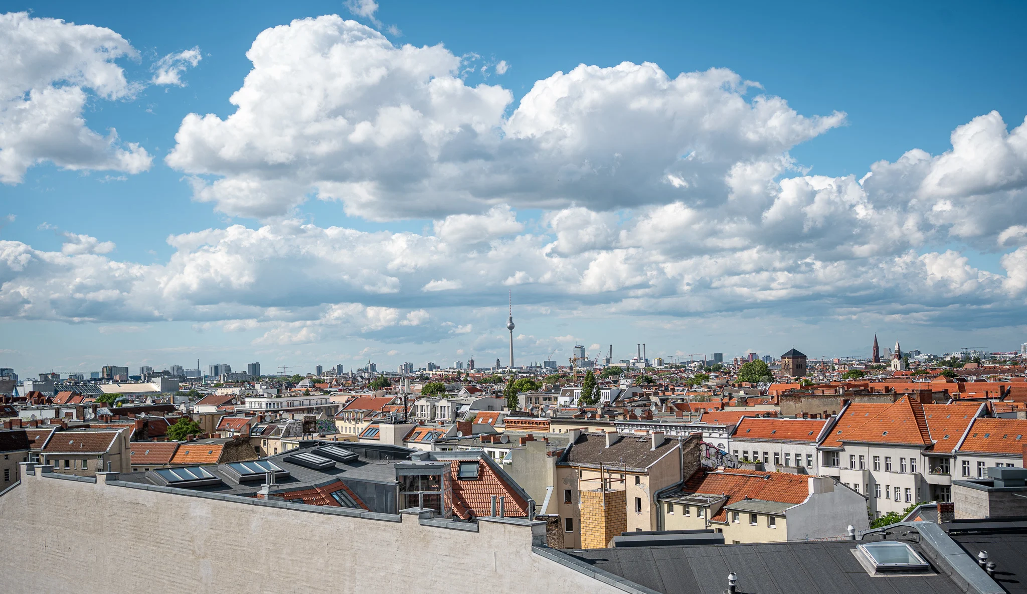 View of Berlin from above at Klunkerkranich rooftop bar