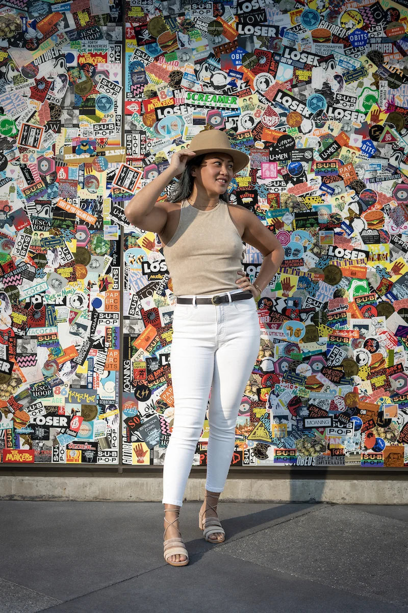 neutral spring outfit with everlane white jeans and furtalk felt hat and alohas sandals