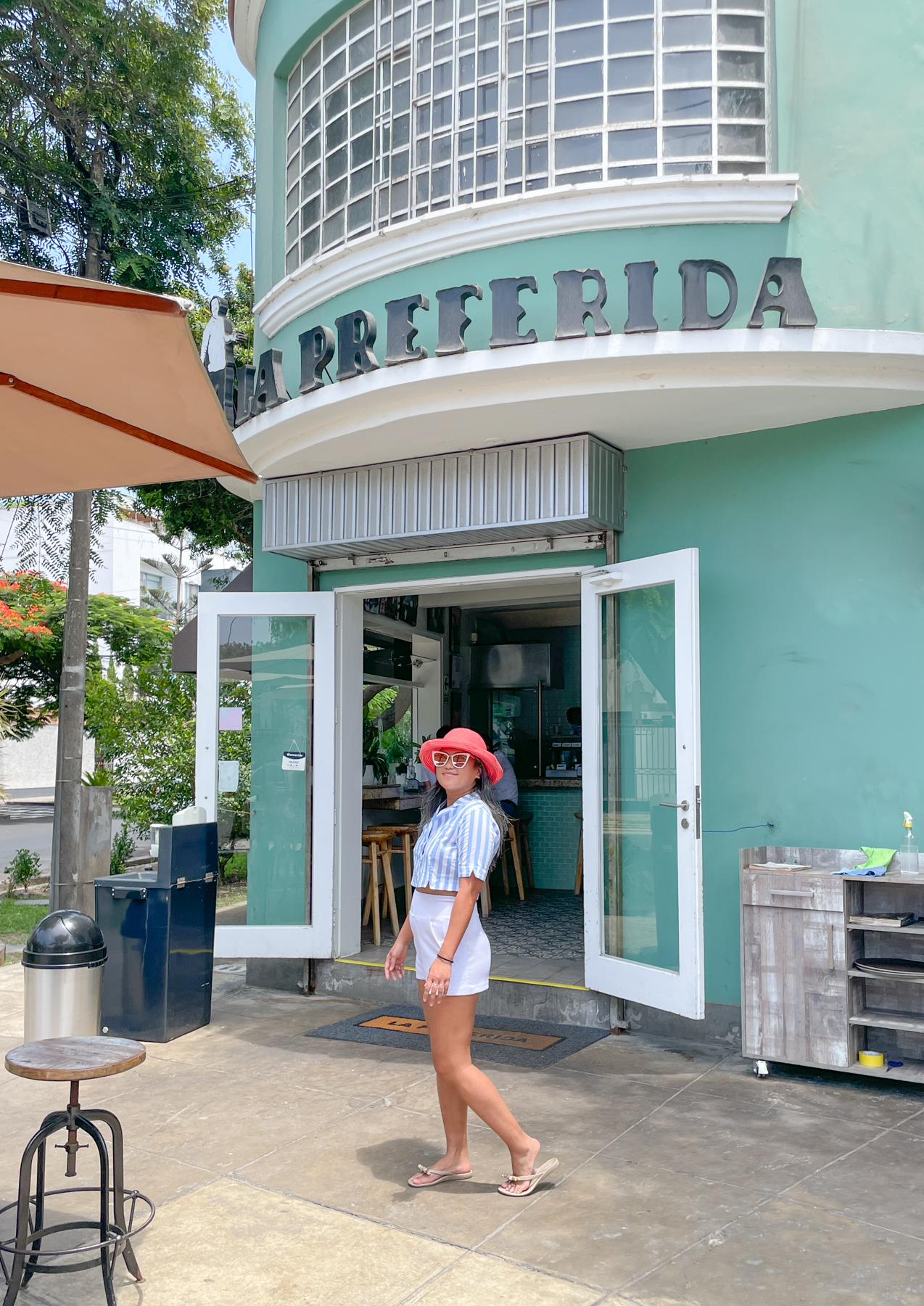 Lima Peru Teal Building Wallaroo Hats Capulet stripe crop top Oka b sandals Quay Reina Sunglasses