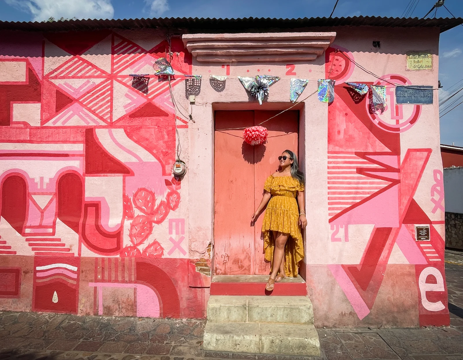 painted street art buildings of Xochimilco neighborhood VICI Dolls Panache Dress