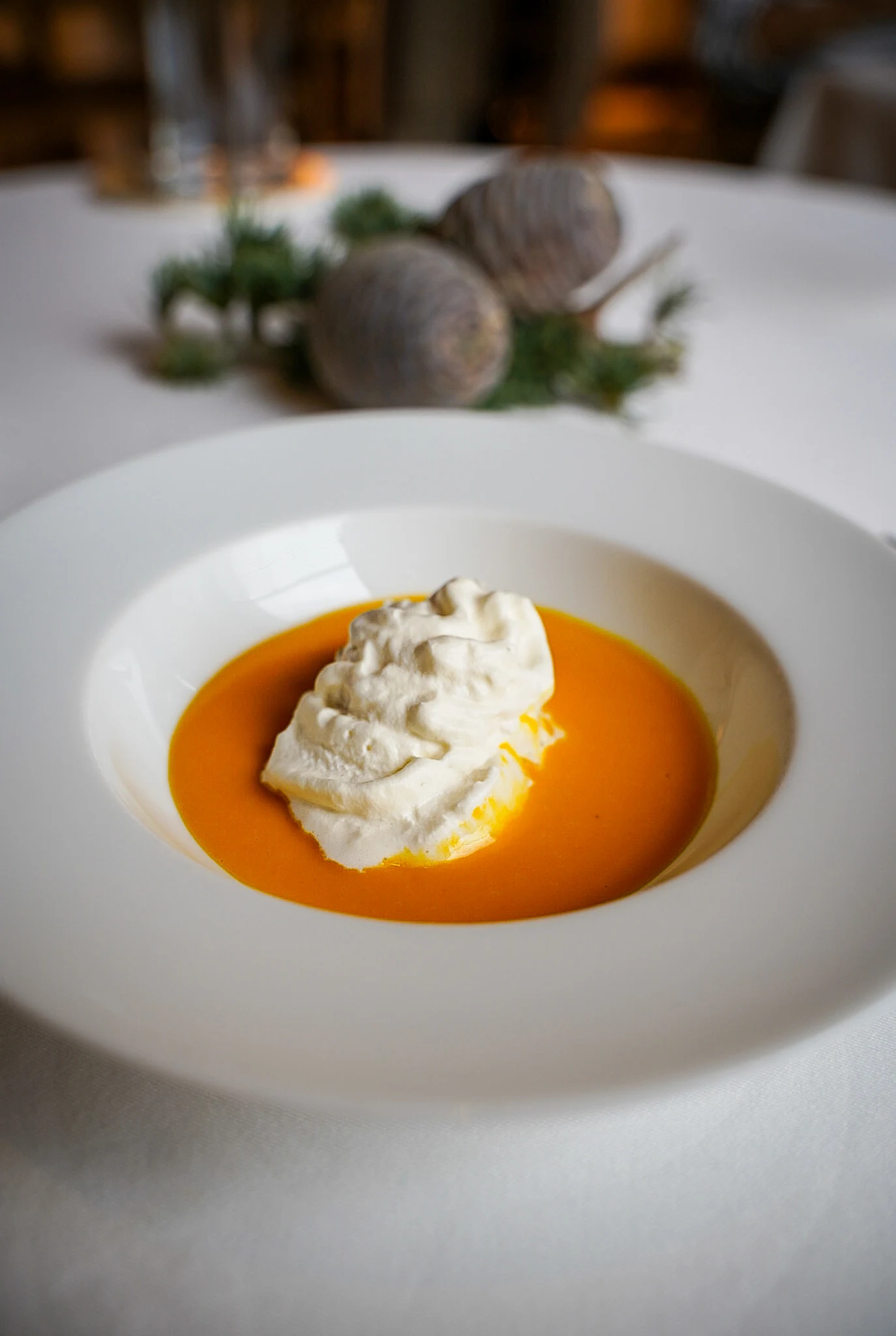 Squash soup with dollop of onion creme fraiche Arpege Paris France