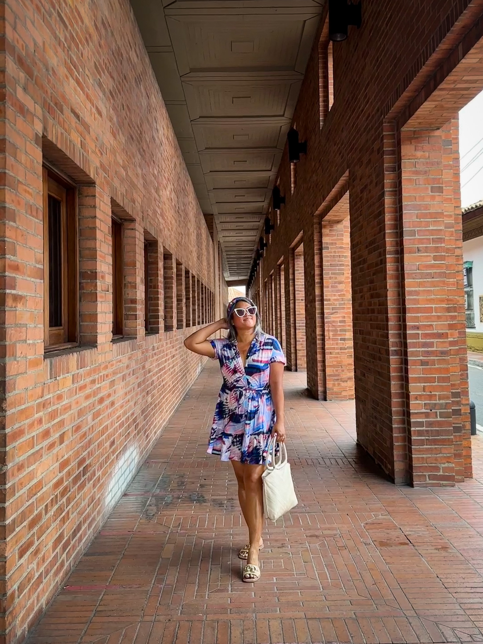 Change of Scenery Sarah Dress in Mosaic Quay Reina Sunglasses Latico Leathers Dalton Handbag Steve Madden Gene Raffia Sandals. Cali Colombia