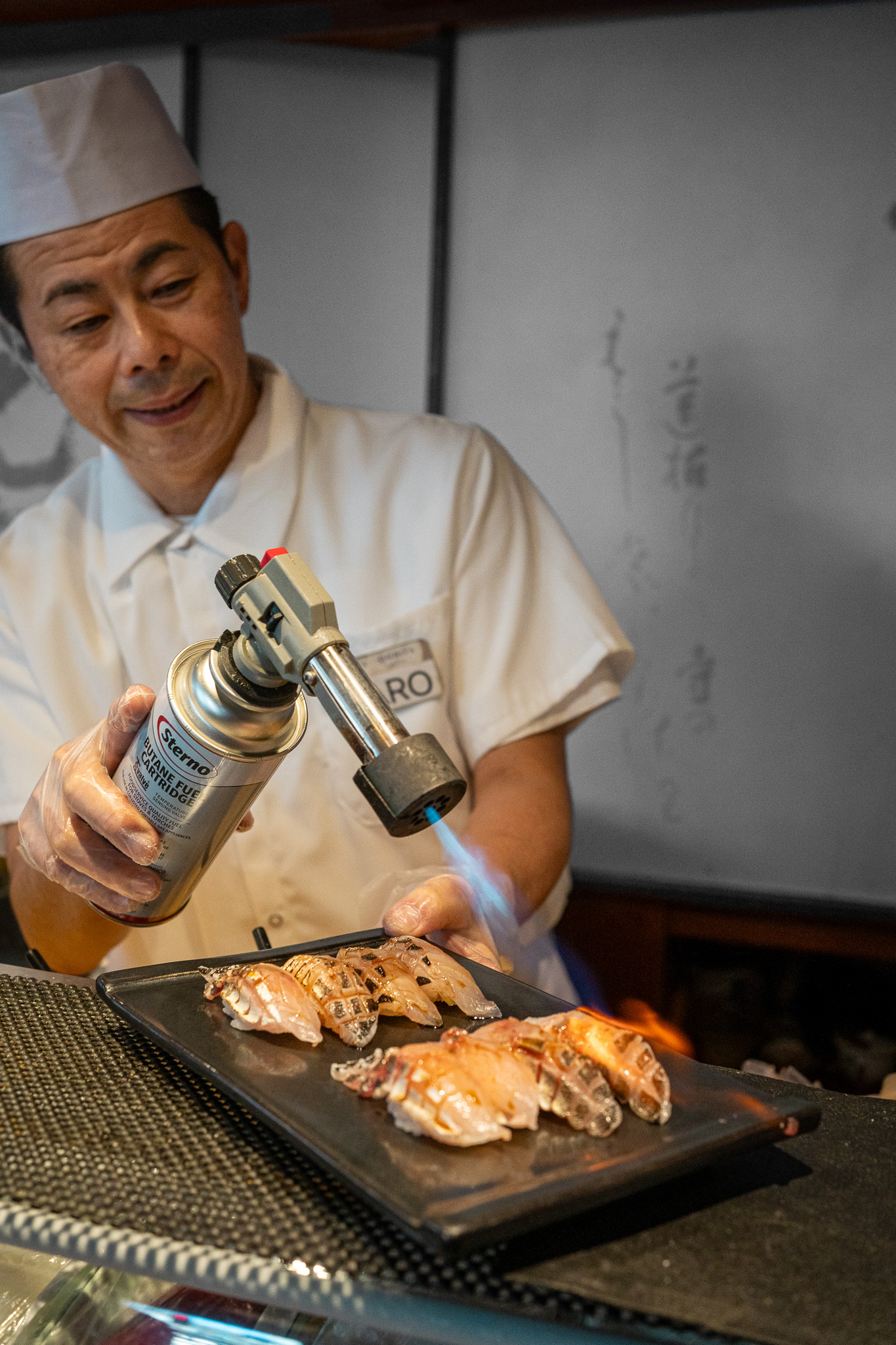 Chef Taro from Shiros Sushi torches Kamasu Japanese Barracuda