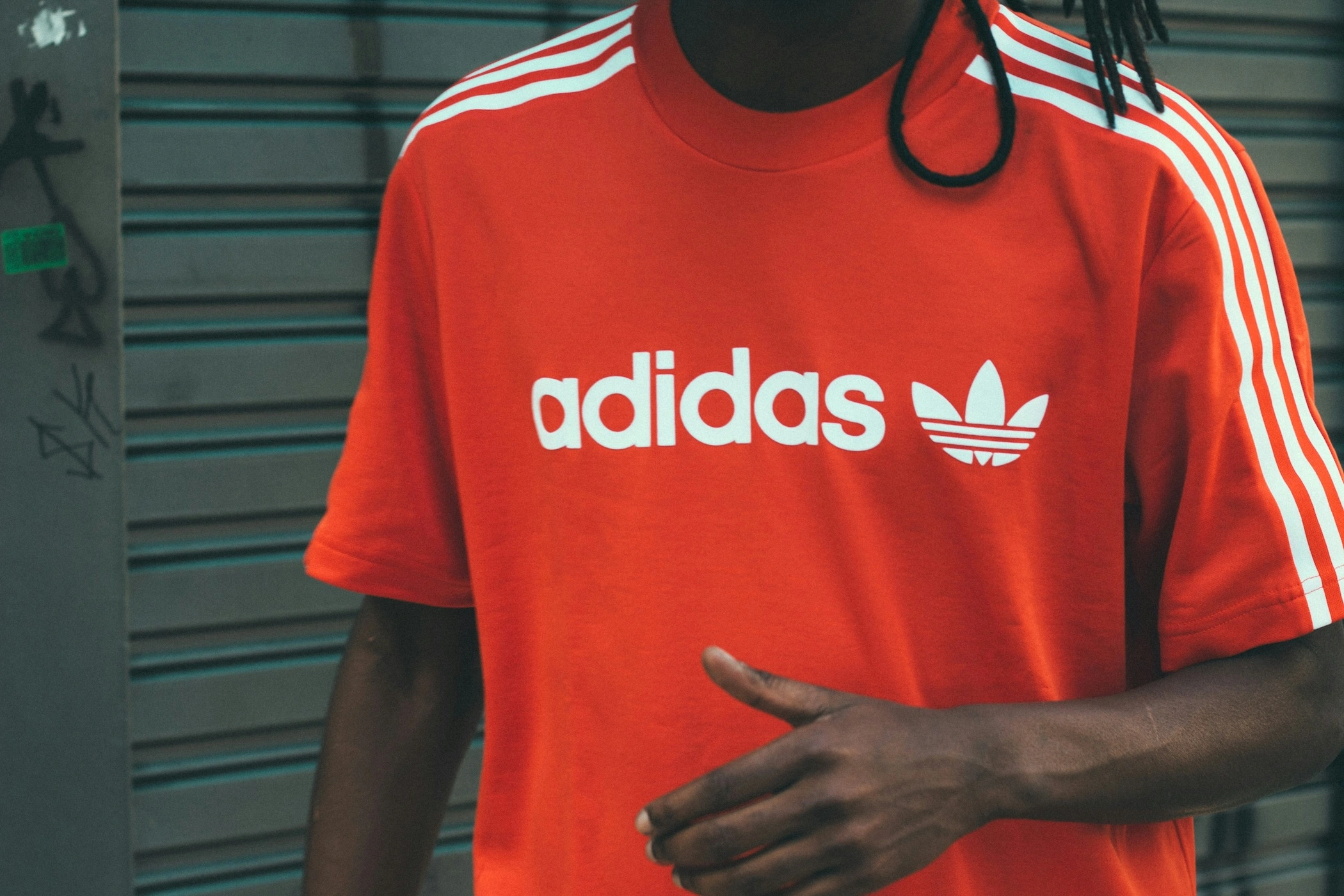 red adidas striped shirt with logo