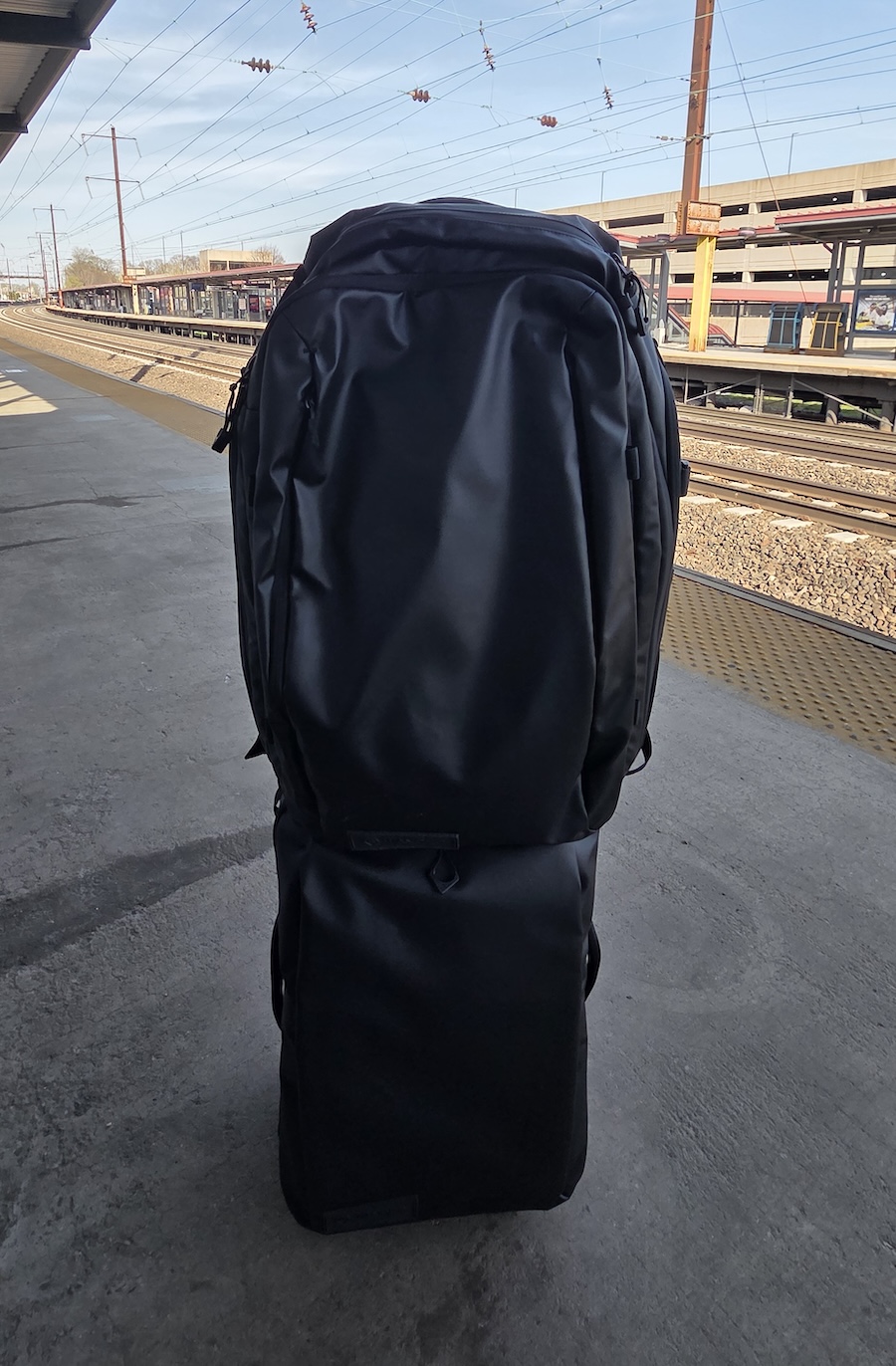 WANDRD Transit backpack and carry on roller bag